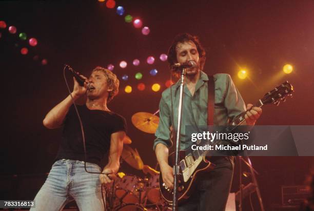 Roger Daltrey and Pete Townshend of The Who perform live on stage at the Capitol Theater, Passaic, New Jersey on 10th September 1979. Townshend plays...