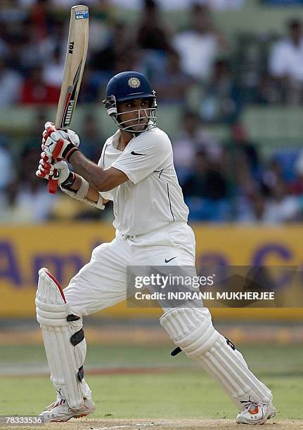 Indian cricketer Sourav Ganguly plays a shot on his way to a century on the first day of the third Test between India and Pakistan in Bangalore, 08...