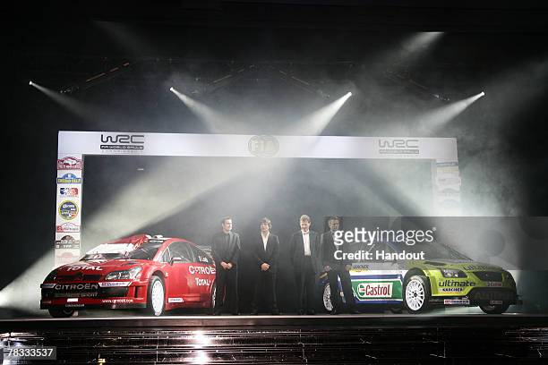 In this handout image provided by FIA, World Rally Champion co-driver Daniel Elena of Monaco and Citroen, World Rally Champion driver Sebastien Loeb...
