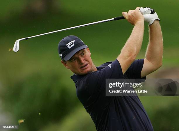 Ernie Els of South Africa plays his second shot into the ninth green during the third round of The Alfred Dunhill Championship at The Leopard Creek...