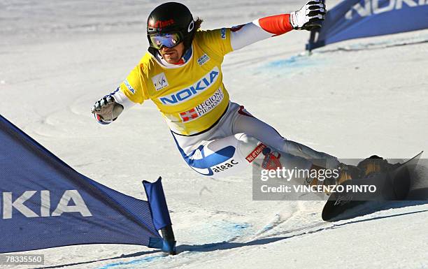 French Mathieu Bozzetto competes in the Men's parallel giant slalom snowboard World Cup race in Limone Piemonte, 08 December 2007. Austrian Manuel...