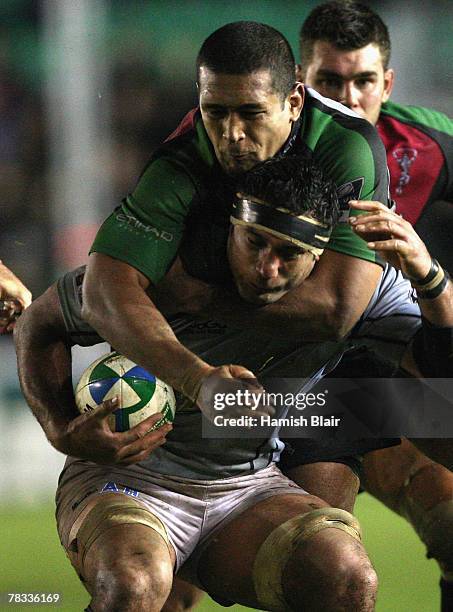 Andrew Blowers of Bristol is tackled by Chris Robshaw of Harlequins during the Heineken Cup Pool 3 match between Harlequins and Bristol at the...