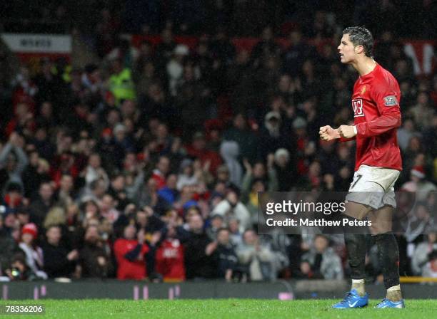 Cristiano Ronaldo of Manchester United celebrates scoring their fourth goal during the Barclays FA Premier League match between Manchester United and...