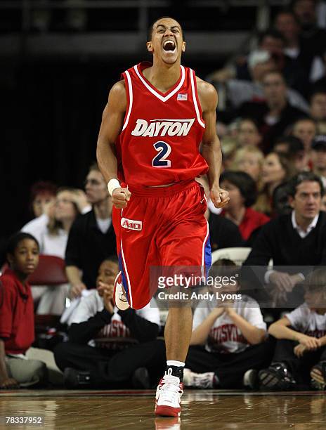 Brian Roberts of Dayton Flyers celebrates after making a shot during the game against the Louisville Cardinals at Freedom Hall December 8, 2007 in...