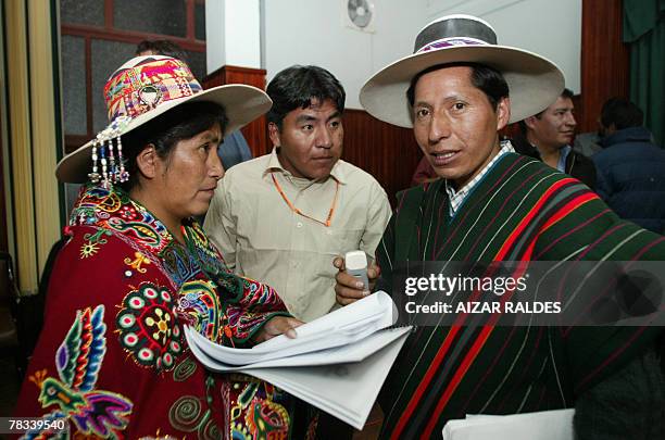 Esperanza Huanca , Evaristo Payllo and Francisco Beisaga of the Constituent Assembly chat 08 December 2008 in the Andean department of Oruro,...