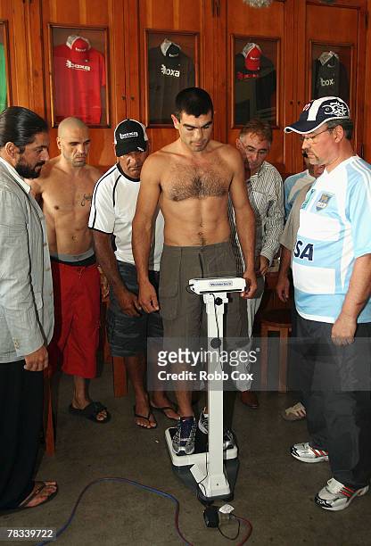 Jose Albero Clavero stands on the scales during the weigh in for his WBA Super Middleweight title fight with Anthony Mundine at the Boxa Bar on...