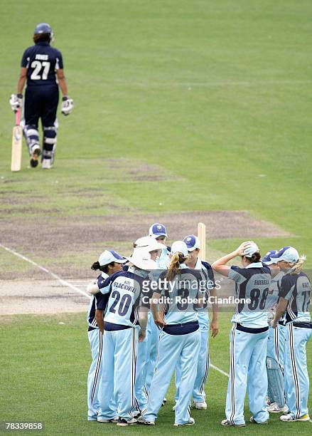 Breakers players celebrate after the dismissal of Melanie Jones of the Spirit during the WNCL match between the Victoria Spirit and the NSW Breakers...