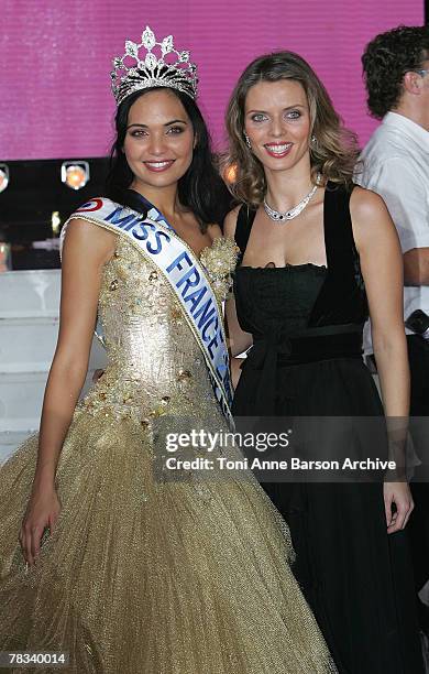 Valerie Begue, Miss Reunion elected Miss France 2008 with Miss France 2002, Sophie Tellier on December 8, 2007 in Dunkerque, France.