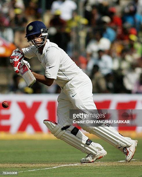 Indian cricketer Sourav Ganguly plays a shot on the second day of the third Test between India and Pakistan at the Chinnaswamy stadium in Bangalore,...