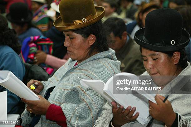 Members of the Constituent Assembly read a text during the discussion of the new Bolivian constitution on December 09, 2007 in the Andean department...