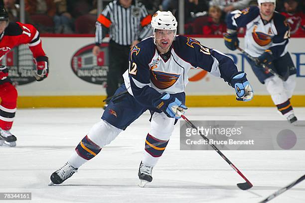 Todd White of the Atlanta Thrashers skates during the NHL game against the New Jersey Devils at the Prudential Center on December 2, 2007 in Newark,...