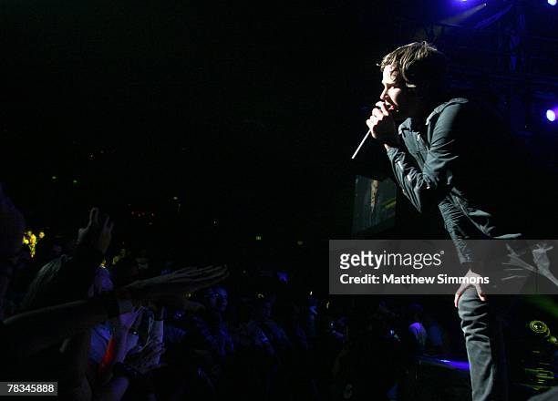 Singer Tom DeLonge of Angels and Airwaves performs during the KROQ Almost Acoustic Christmas at the Gibson Amphitheatre on December 8, 2007 in Los...