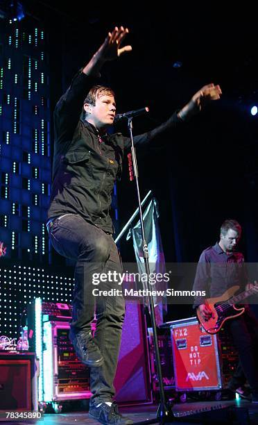 Singer Tom DeLonge of Angels and Airwaves performs during the KROQ Almost Acoustic Christmas at the Gibson Amphitheatre on December 8, 2007 in Los...