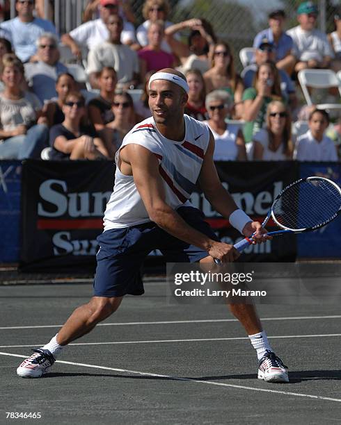 James Blake plays mixed doubles during the Andy Roddick Foundation Celebrity Tennis Exhibition on December 9, 2007 in Boca Raton, Florida.