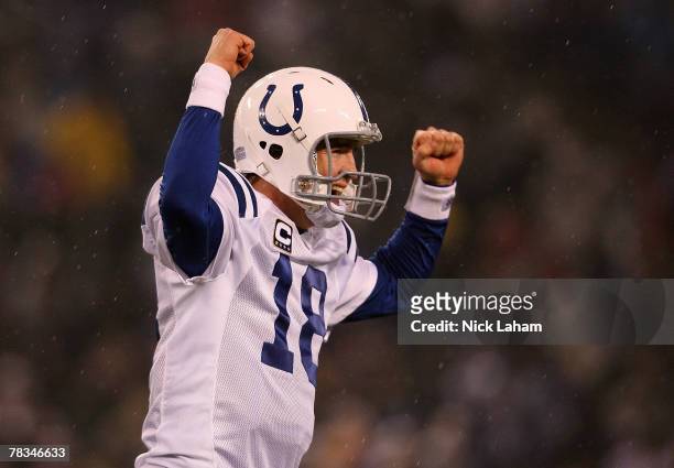 Peyton Manning of the Indianapolis Colts celebrates a first half touchdown against the Baltimore Ravens during their game on December 9, 2007 at M&T...