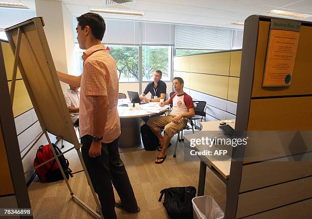 Singapore-education-foreign,FEATURE by Bernice Han International students practise their lessons in a break room at the global graduate business...