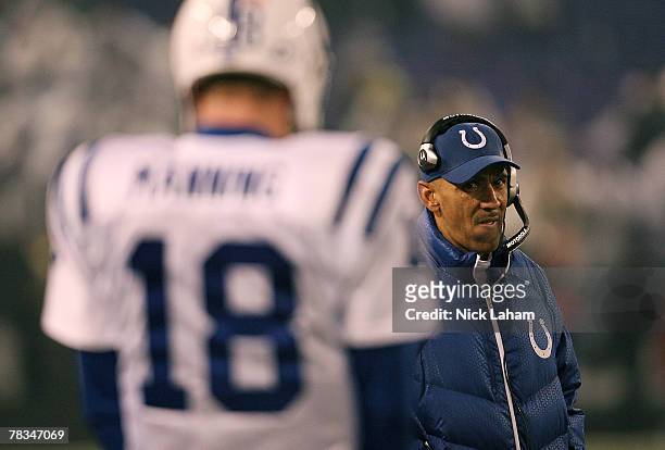 Head coach Tony Dungy of the Indianapolis Colts looks to Peyton Manning against the Baltimore Ravens during their game on December 9, 2007 at M&T...