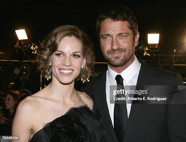 Actress Hilary Swank and actor Gerard Butler arrive at the premiere of Warner Bros.' "P.S. I Love You" held at Grauman's Chinese Theater on December...