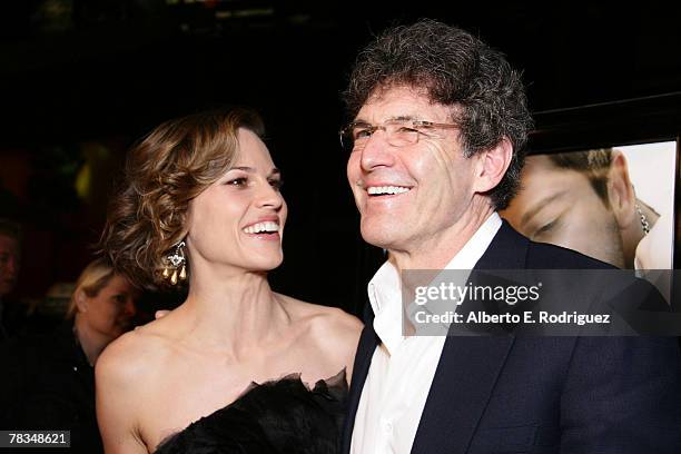 Actress Hilary Swank and Warner Bros. President Alan Horn arrive at the premiere of Warner Bros.' "P.S. I Love You" held at Grauman's Chinese Theater...