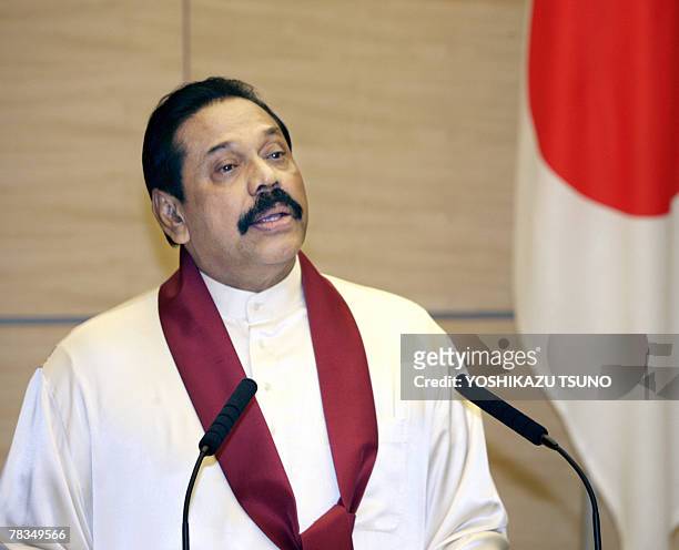 Visiting Sri Lankan President Mahinda Rajapaksa speaks at a press conference after the bilateral talks with Japanese Prime Minister Yasuo Fukuda at...