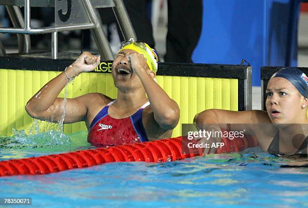 Thailand's Natthanan J Krajang is seen after the finish of the 200m freestyle women's final at the 24th Southeast Asian Games , in Korat, 10 December...