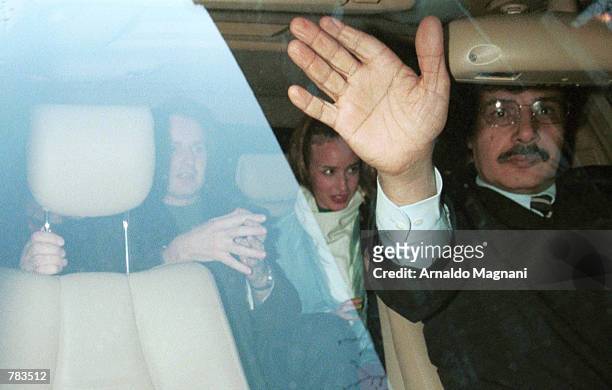 Elizabeth Jagger, center, the daughter of Rolling Stone Mick Jagger, sits in a car with a friend January 30, 2001 in New York City after having lunch...