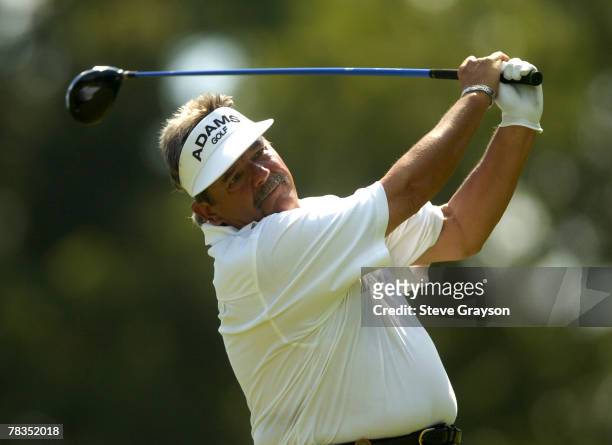 Rodger Davis hits from the 11th tee during the third round of the 2005 U.S. Senior Open Championship at NCR Country Club in Kettering, Ohio July 30,...