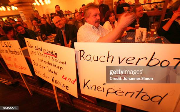 Convinced cigarette smokers attend a smokers protest rally at Loewenbraeu Keller beer hall on December 10, 2007 in Munich, Germany. A coalition of...