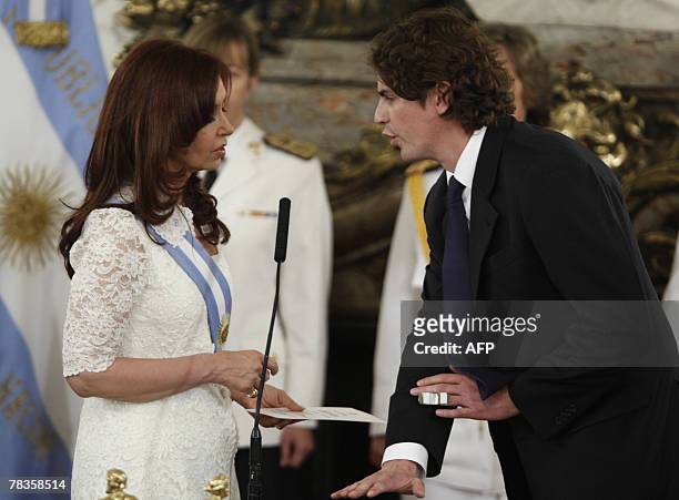 Martin Lousteau is sworn-in as Economy minister by the new Argentine president Cristina Fernandez de Kirchner, during a ceremony at the presidential...