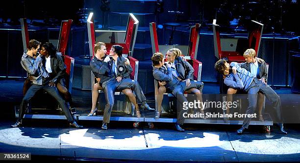 Gary Barlow, Mark Owen, Jason Orange and Howard Donald of Take That perform at Manchester Arena on December 10, 2007 in Manchester, England.