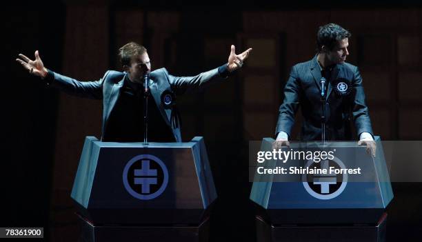 Gary Barlow and Jason Orange of Take That perform at Manchester Arena on December 10, 2007 in Manchester, England.