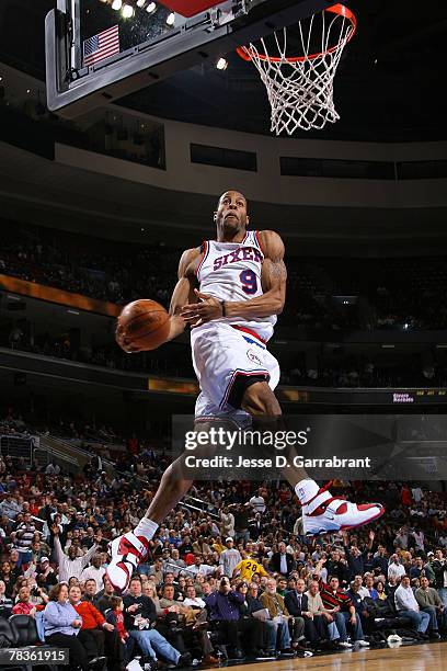 Andre Iguodala of the Philadelphia 76ers shoots against the Houston Rockets at the Wachovia Center December 10, 2007 in Philadelphia, Pennsylvania....