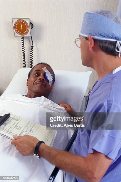 doctor with patient - post operation stock pictures, royalty-free photos & images