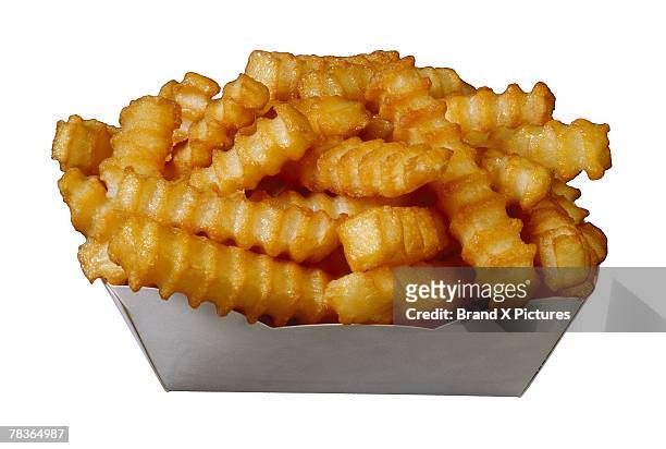crinkle-cut french fries - scalloped stock pictures, royalty-free photos & images