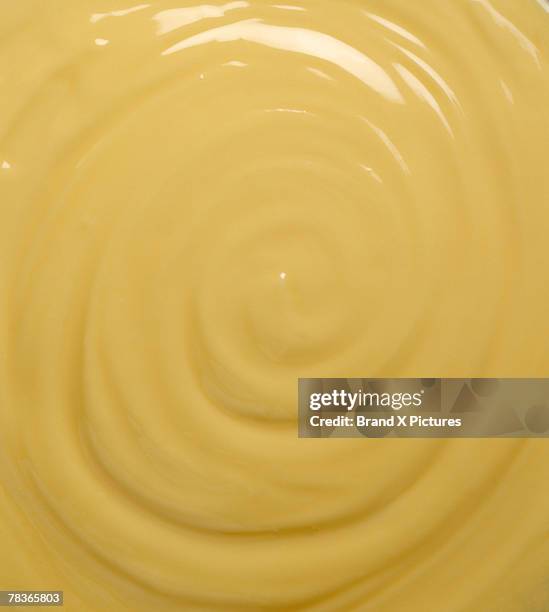 melted cheese sauce - cheese sauce stock pictures, royalty-free photos & images