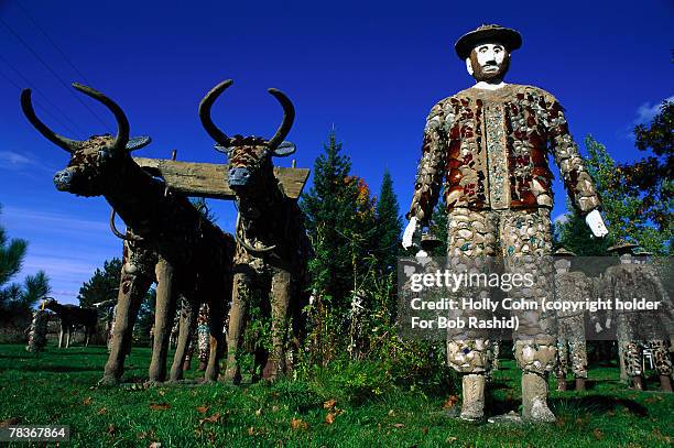 sculptures in concrete park, phillips, wisconsin, usa - paul bunyan ox stock pictures, royalty-free photos & images