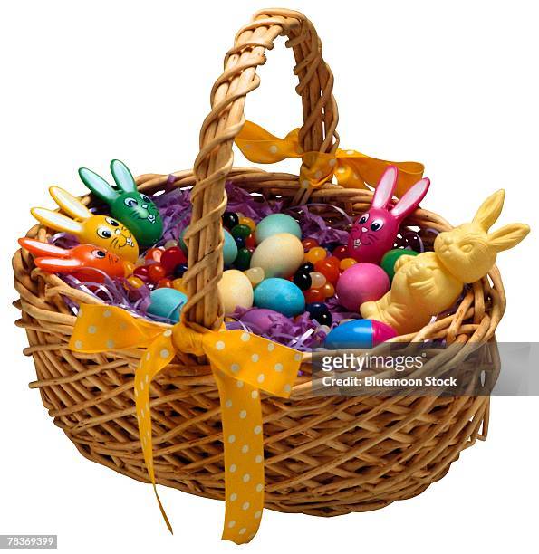 easter basket - easter basket with candy stock pictures, royalty-free photos & images
