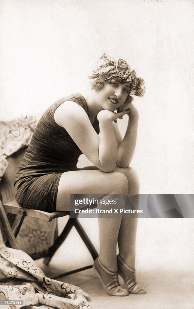Woman in bathing suit and cap