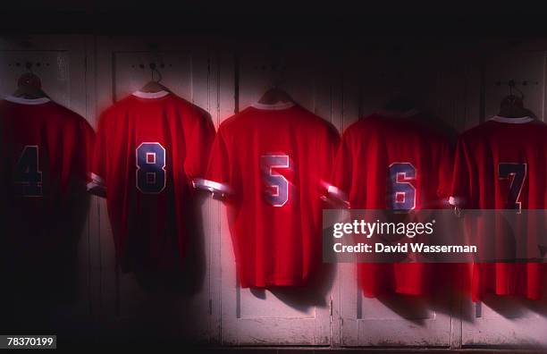 jerseys hanging - locker room wall stock pictures, royalty-free photos & images