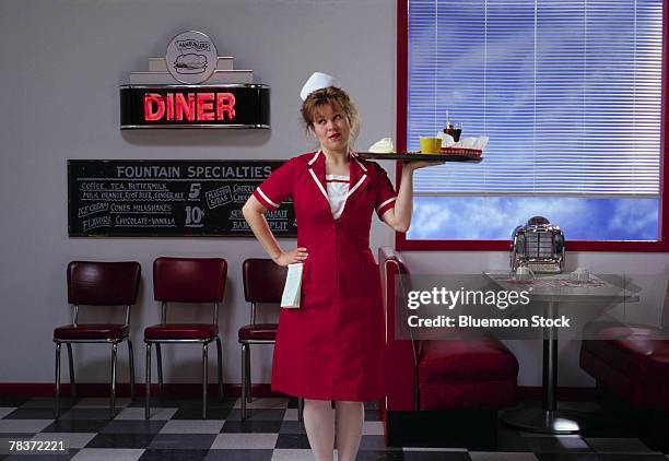 diner waitress with food tray - waitress booth stock pictures, royalty-free photos & images