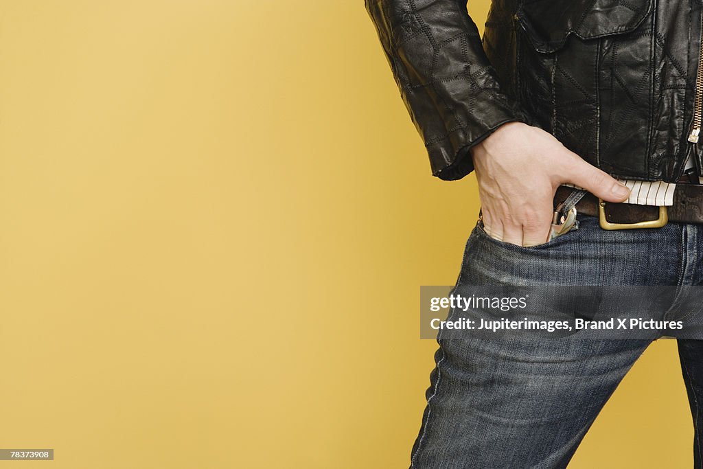 Mid-adult man with hands in pocket