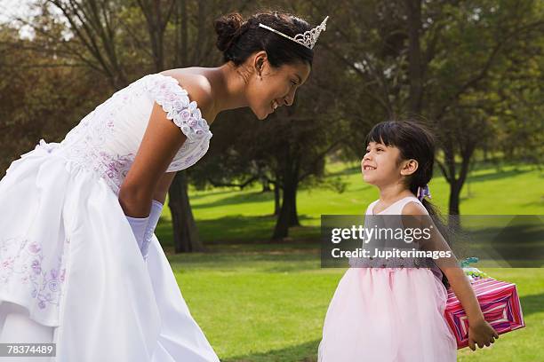 teenage girl receiving gift at quinceanera - quinceanera party stock pictures, royalty-free photos & images