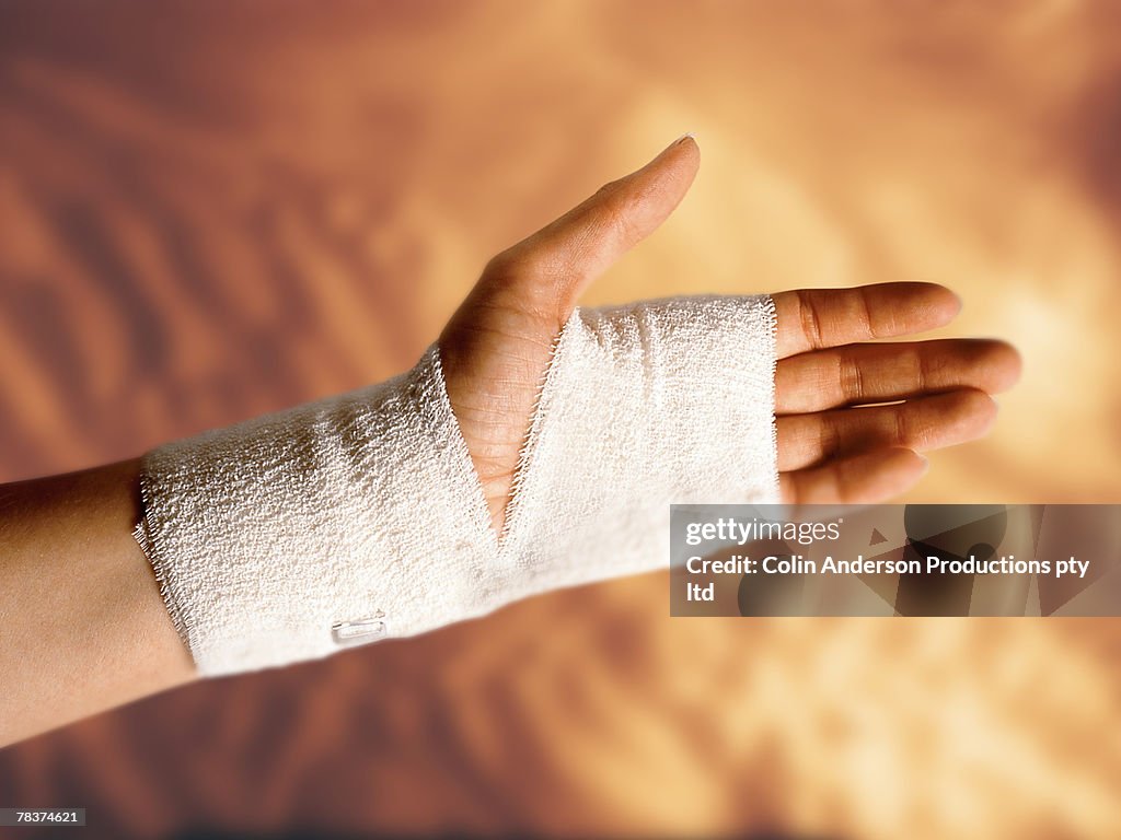 Bandaged Hand Injury High-Res Stock Photo - Getty Images