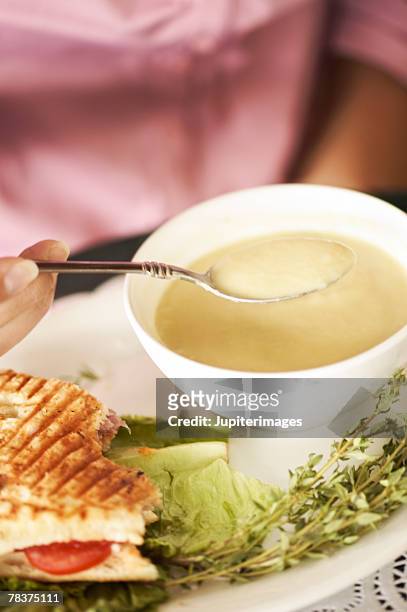 woman with soup and sandwich - panorering bildbanksfoton och bilder