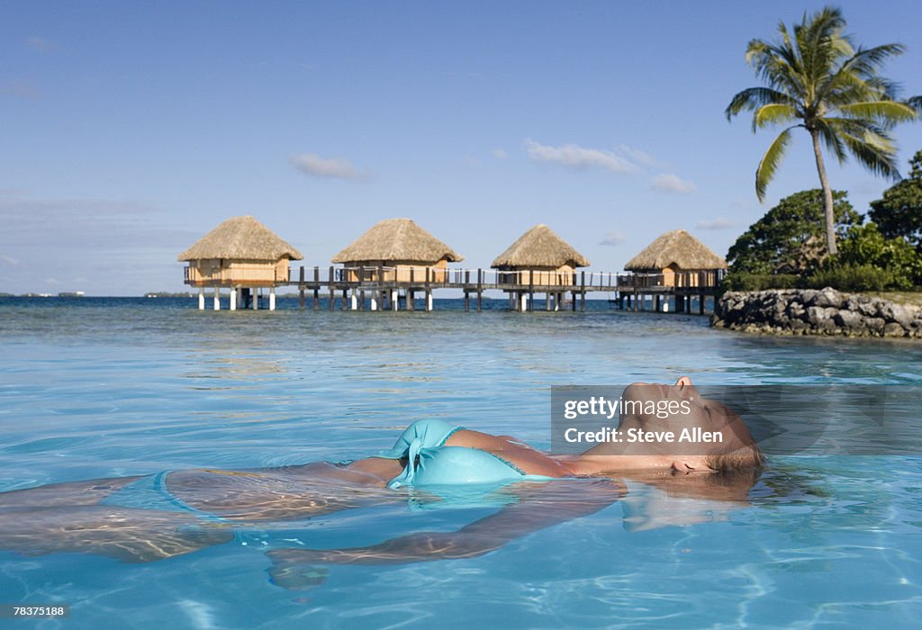 Woman floating in water