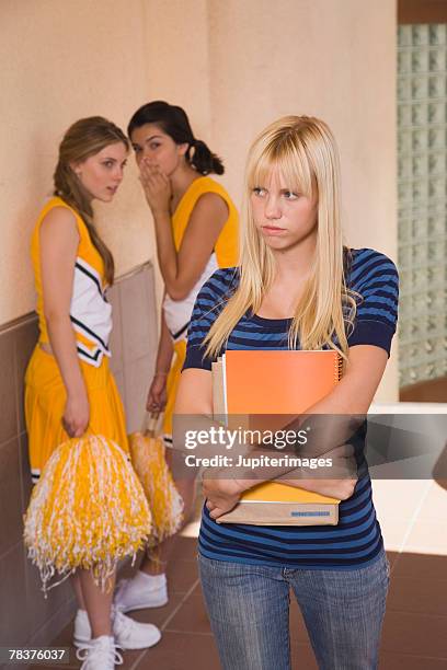 sad teenage girl - ostracized stock pictures, royalty-free photos & images