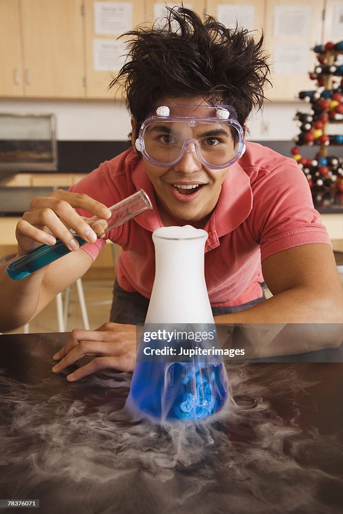 Boy Body Experiments Teenage Boy Performing Science Experiment High-Res Stock Photo - Getty ...