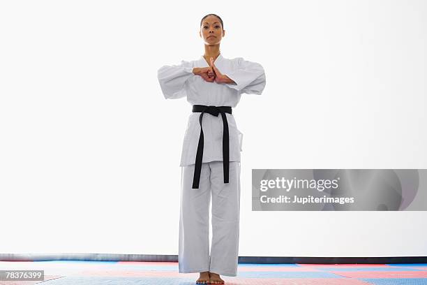woman doing martial arts - women judo stock pictures, royalty-free photos & images