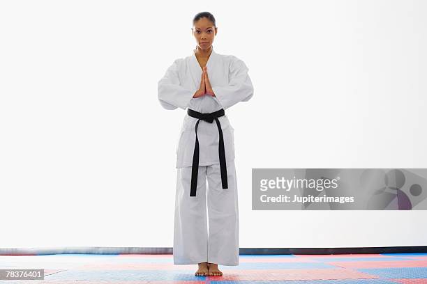 woman meditating - judo woman ストックフォトと画像