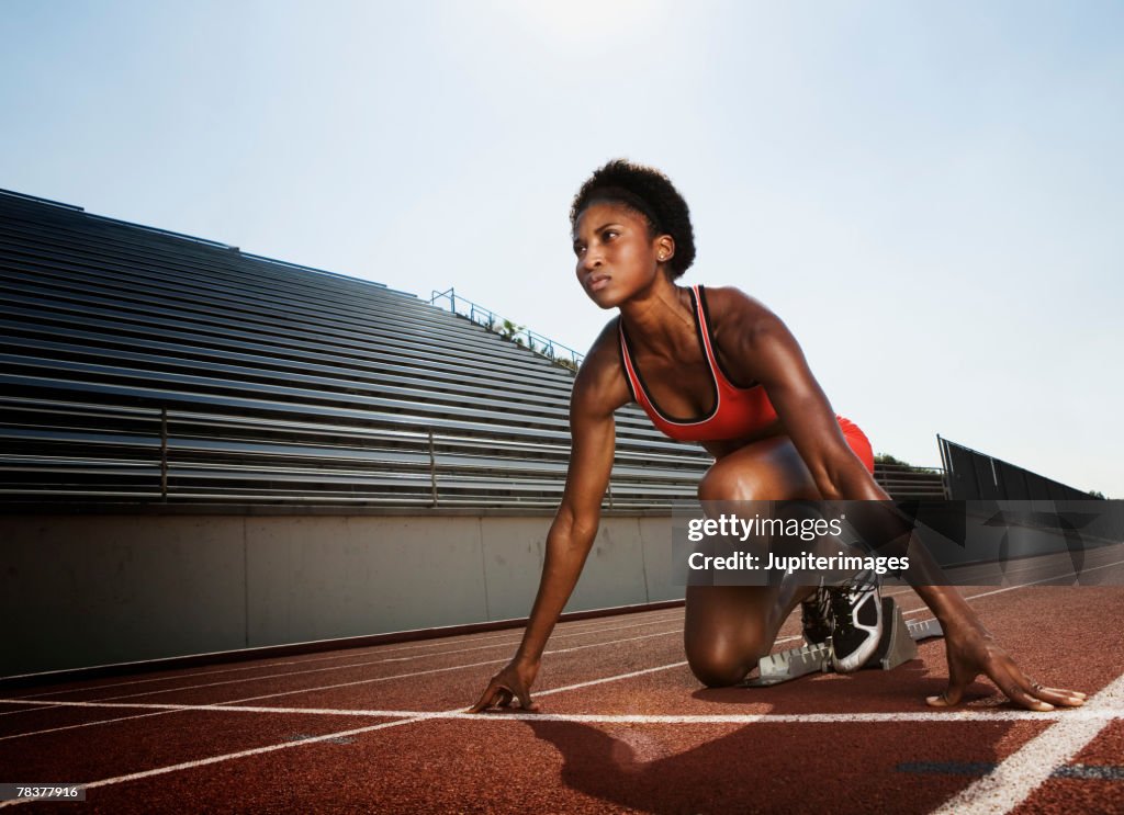 Athletic woman preparing for race